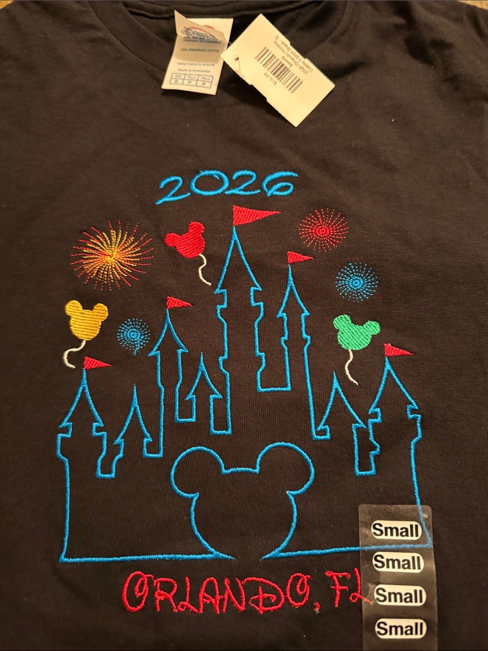 Delta Black Tee with Blue Castle and Colorful Embroidery